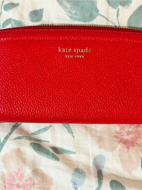 kate spade red pebbled leather long zip wallet with gold logo